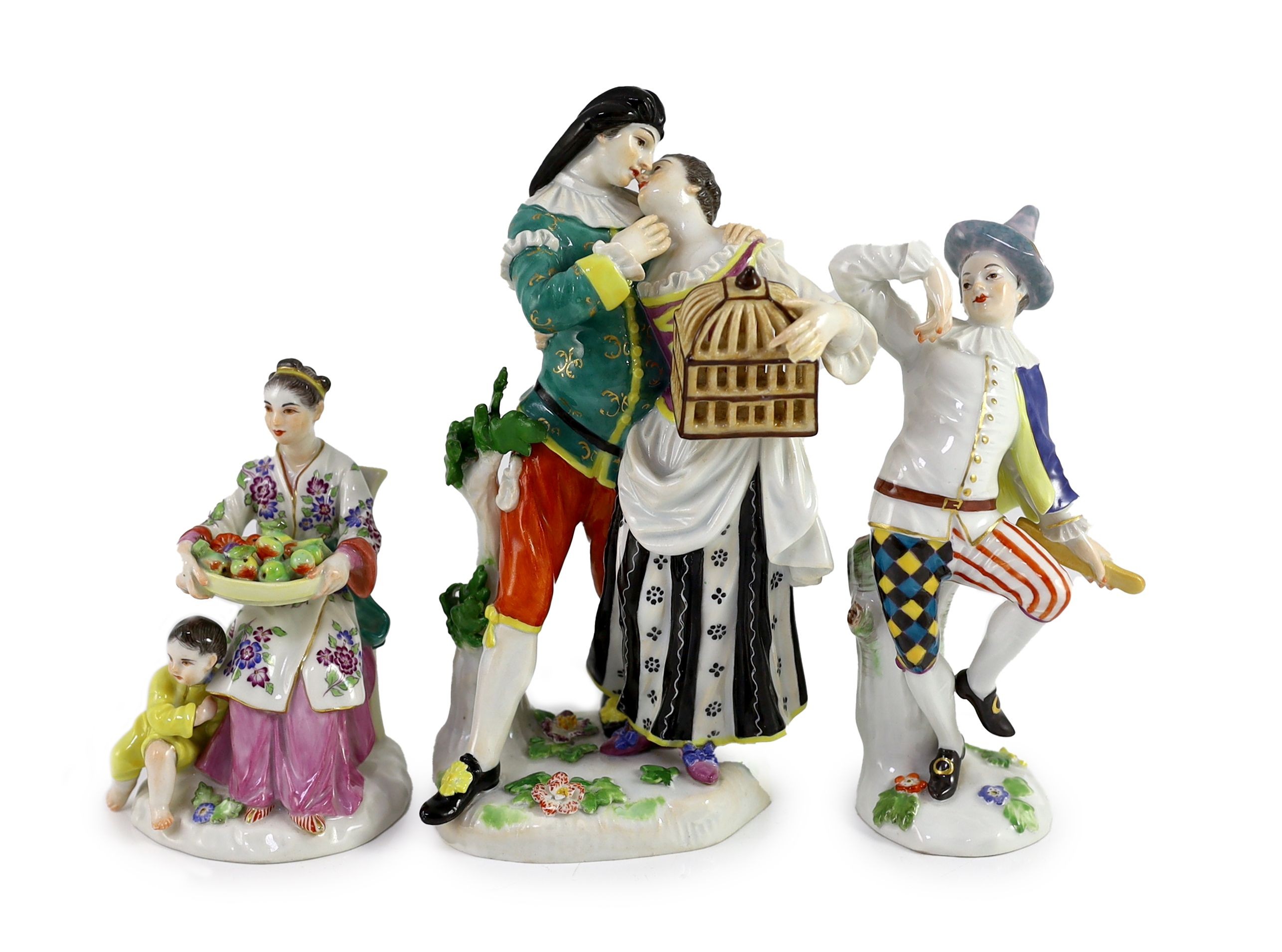 A Meissen group of Scaramouche and Columbine, a similar group of a Chinese mother and child and a figure of Harlequin, all 20th century, 11 - 17.5cm high, Scaramouche group restored (3)